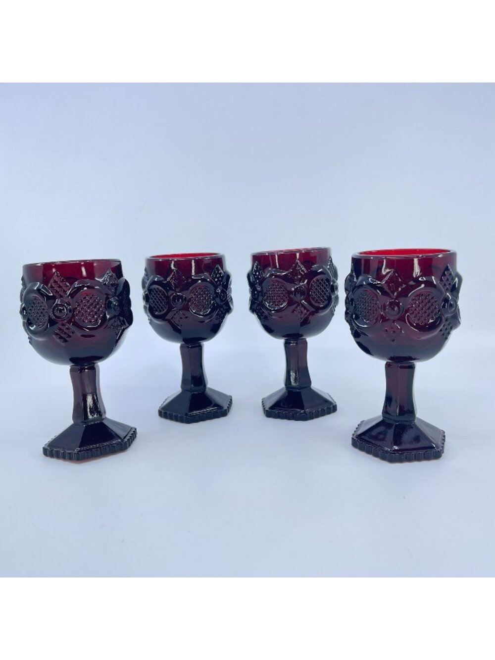 vintage avon 1876 cape cod ruby red glass cordial set of 4 hexagonal base